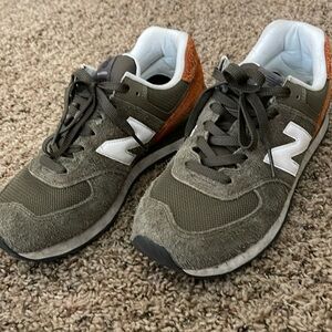 New Balance 574 worn once Men’s size 8.5 Woman’s 10